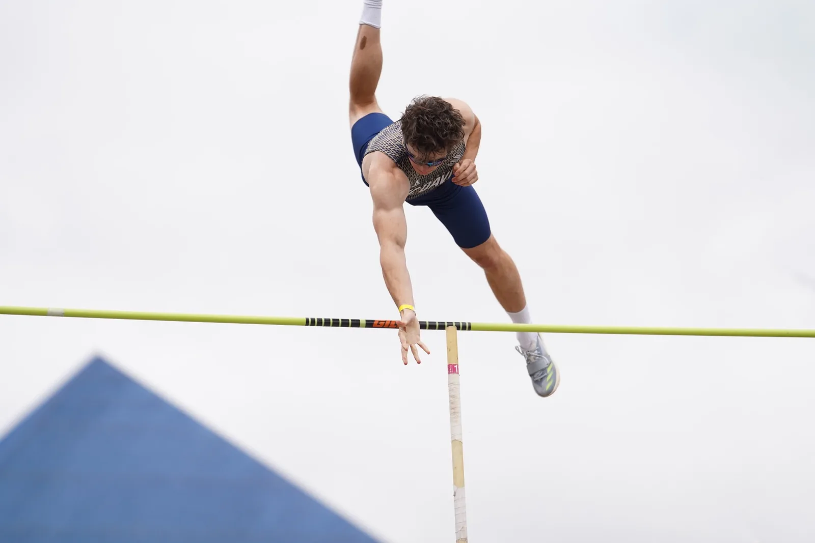 Aidan Hagerty clearing a pole vault bar